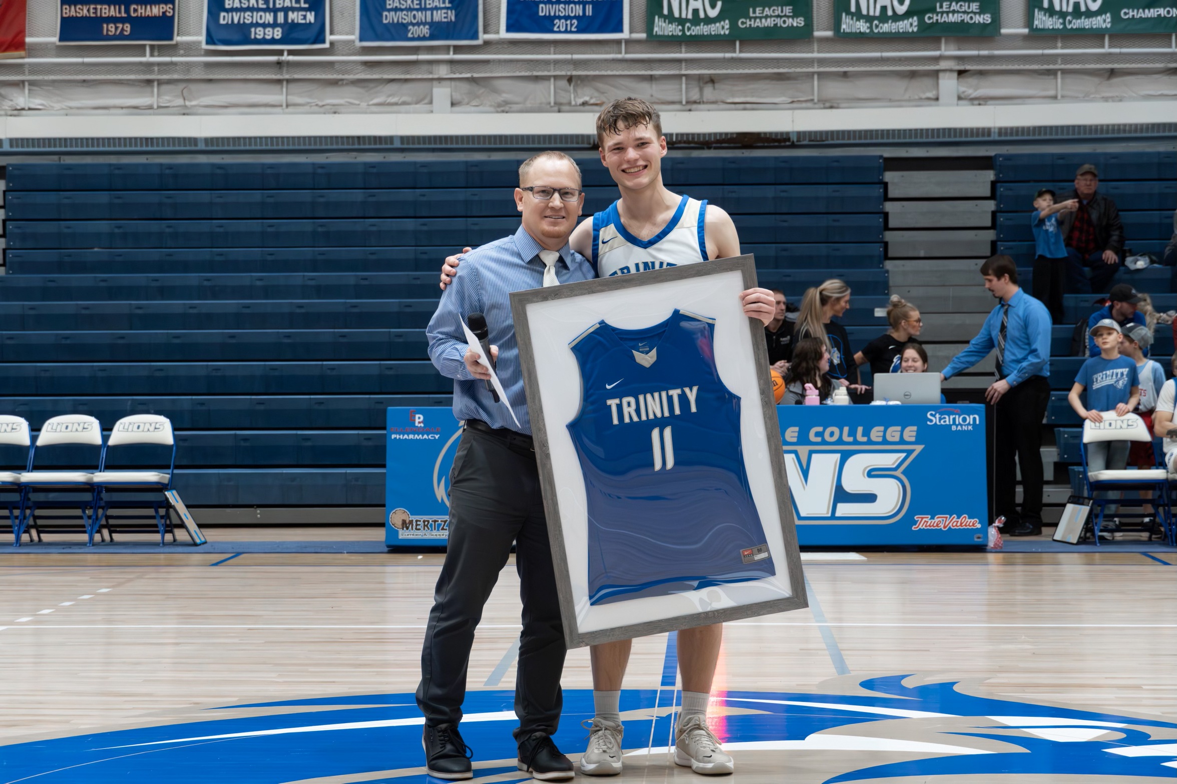 Trinity Lions Shine: Seniors Honored as Basketball Team Triumphs in Double Win Weekend